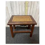 rustic wooden stool with rattan top