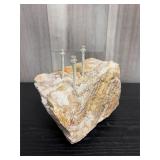 fine-grained quartz-rich sandstone rock with drill