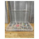 Clear plastic tacks box with assorted spoon lures