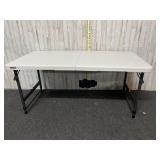 Adjustable height Folding table
