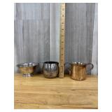Three small vintage silver plated pitchers