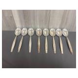Set of W.M Roger's international silver spoons