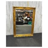 French-style wooden framed wall mirror