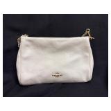 cream pebbled leather Coach shoulder bag
