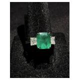 3.32CT Emerald & 1.04CTS Diamond Ring 18KT