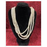 Faux pearl necklace with silver clasp