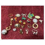 Assorted clip-on earrings and pins
