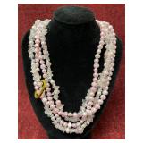 multi-strand pink layered statement necklace