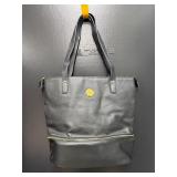 black double-decker leather tote bag by Joy Mangan