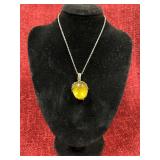 Silver necklace with yellow pendant