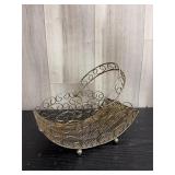 Vintage silver-plated footed basket with arched ha