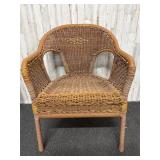 Woven armchair