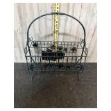 vintage green and black metal wire magazine rack