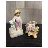 Boy with dog & Shephard girl porcelain figurines