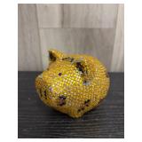 Golden decorated piggy bank
