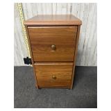 Brown wooden filing cabinet on wheels