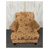 traditional upholstered brown & red armchair