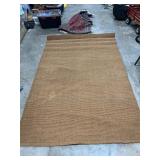 Brown woven area rug