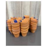 Lot of 2' terracotta pots