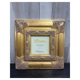 Gold-toned Florentine wooden frame
