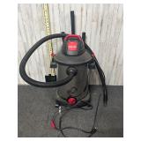 black and red Shop-Vac wet/dry utility vacuum