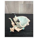 Bisque porcelain figurine fallen ice skater