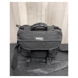 black Nikon camera shoulder bag with Nikon accesso