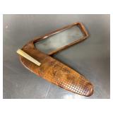 Folding pocket magnifying glass