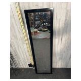 Black framed door mirror