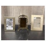 3 small table top picture frames