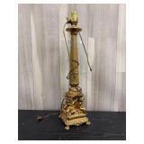 Gold-toned cast aluminum cherubs lamp