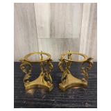 Ornate brass candleholders