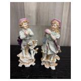 Hand-painted porcelain figural bud vases