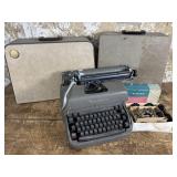 Typewriter, Sewing Machine, and Projector