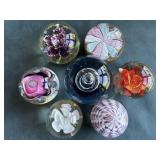 Seven Paperweights