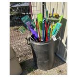 Barrel of cleaning supplies