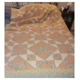 Homemade stitched Patchworked design quilt