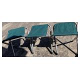 Three Coleman foldable seats