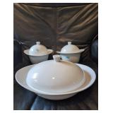 3 white covered bowls dishes