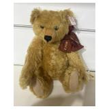 Stiff bear plush stuffed animal