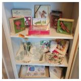 Cards, Figurines, Towels, everything on shelves