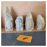 Carved Stone Faces Marked on the bottom