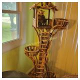 Rustic Multi  level tree house with ladders and