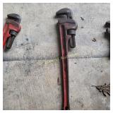Large red pipe wrench