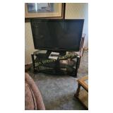 Pana sonic flat screen TV and stand