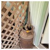 Milk  can and post