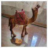 Hand carved wooden camel figurine like from an