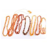 Lot of 8 Amber Necklaces.