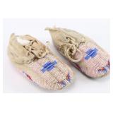 Pair of Beaded Child