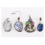 Lot of 4 Sterling Silver Pendants.